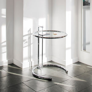E 1027 Adjustable Table in chrome plated with clear glass top